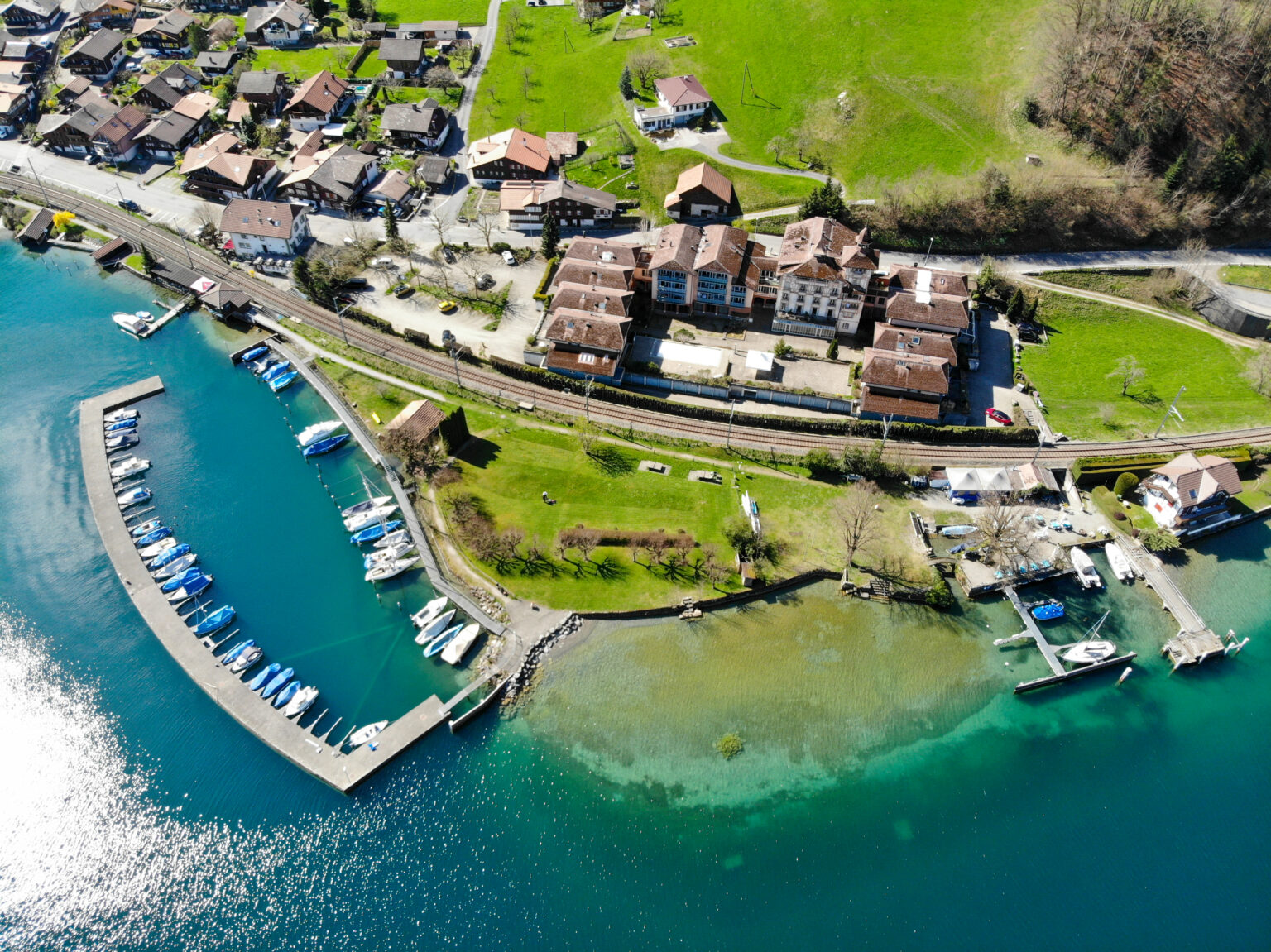 Aerial view of Hotel Du Lac, Därligen harbour and the clear water of Lake Thun